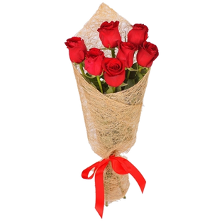 Букет из семи красных роз в упаковке